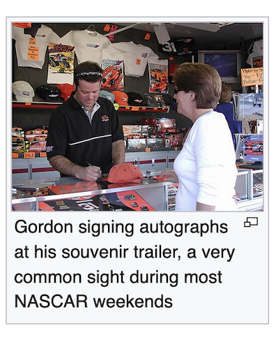 Robby Gordon signing autographs at NASCAR in Phoenix